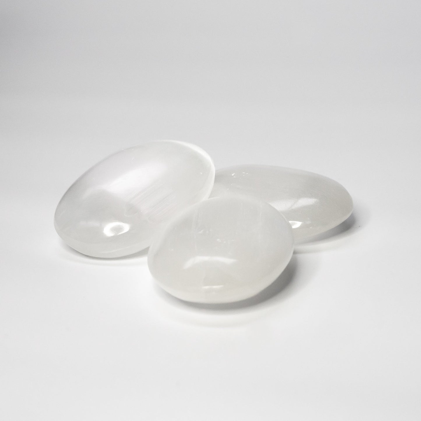 Selenite palm stones white